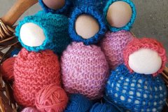 Knitting-dolls-and-balls-of-yarn